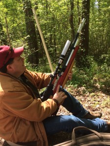 David Slade checks his range before adjusting his scope for his next shot
