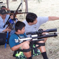 Kevin Yee instructs his son, Andrew, in preparation for Andrew's first match