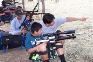 Kevin Yee instructs his son, Andrew, in preparation for Andrew's first match