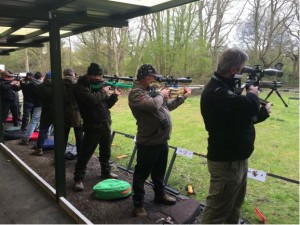 Shooting Silhouettes in the “shed.” Silhouette and overall winner Conor McFlynn 3rd from left. (Green Rifle) 