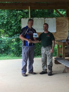 Harold receiving his 3rd place trophy