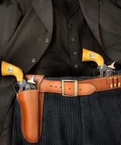 As worn by John Wayne as J.B. Books in The Shootist the pair of limited edition hand engraved Colt/Umarex Single Actions are a perfect fit for Jim Lockwood’s copy of the holster and cartridge belt worn in the film by Wayne. 