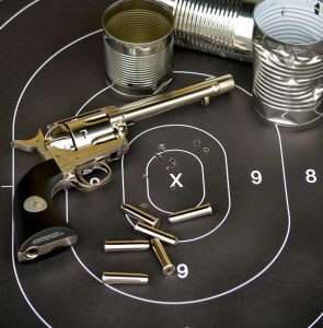Target shot Duelist Style at the SASS target distance of 10 yards put all rounds in the 10 and X rings. Lead and tin mixed it up pretty good too, as these shot up cans demonstrate.