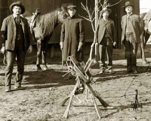 The Mauser Broomhandle, or C96, was one of the earliest and most successful semiautomatic pistols. Introduced in 1896, by the time this photo was taken, likely between 1902 and 1904, western lawmen were already carrying semi-autos. In this photo, Anadarko, Oklahoma Territory Sheriff James Thompson and his deputies are displaying their guns for photographer Annette Ross Hume. Take a close look at the guns. At the top is Sheriff Thompson's shoulder-stocked Broomhandle. (Photo courtesy Western History Collections, University of Oklahoma)