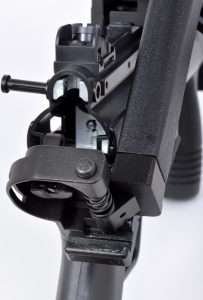 The CO2 loads into the back of the receiver by releasing the shoulder stock retaining pin (far left) and lowering the stock. The screw at the back of the stock mount is used to tighten and seat the CO2 after the stock is closed and the retaining pin re-inserted.