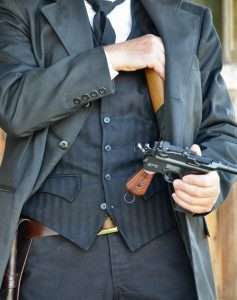 The lighweight, hollow shoulder stock could be carried in a coat pocket (pockets were much bigger in the Old West!) 
