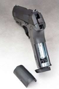 The Umarex PX4 Storm loads the CO2 cartridge into the back of the pistol grip by removing the lower portion of the backstrap.