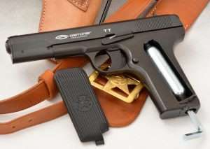 The 12 gram CO2 cartridge is loaded into the left side of the grip frame by lifting off the grip panel. An included hex head tool is used to seat the CO2.