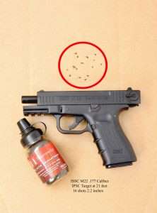 A total of 16 shots from 21 feet fired offhand at an IPSC cardboard competition target. All shots are grouped in the A Zone.