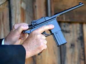 The bolt has to be pulled to the rear to chamber the first round.