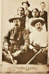 Legendary Oklahoma lawman Heck Thomas (seated at left) carried a Colt Single Action and Winchester lever action rifle in pursuit of outlaws.
