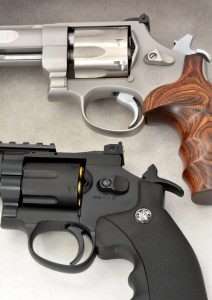 Notice the trigger positions with the hammer down. Double action trigger pull has to cock the hammer and rotate the cylinder. With the hammer manually cocked, the trigger no longer has to rotate the cylinder and moves further back for a single action shot. In between these two extremes, the trigger can be staged for a more accurate double action shot.