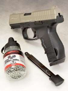 The Umarex uses an 18 round stick magazine with a full-sized floor plate to give the gun proper lines. The quick load design uses a locking follower (shown locked at the bottom of the magazine) and a loading port (with BB showing) that allows you to virtually put 18 BBs into the magazine.