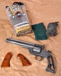 In Photo 1 you can see all of the basic materials needed to begin stripping the hard finish off the standard model Schofield airgun.