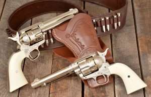 The Umarex Colt BB and pellet models are available in blued, nickle, and engraved versions. Shown with the Western Justice holster and BB-pellet cartridge belt.