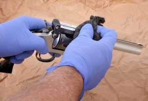 Always polish off the finish by moving in a straight back and forth direction, never in circles. Any surface scratches, and there will be surface scratched should all be linear. Polishing off the finish on the back of the recoil shield requires a lot of thumb pressure and again, polishing in a straight line from the base of the recoil shield to the outer edges.