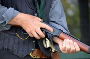 To load the Walther lever action you press in on the rifle’s loading gate…