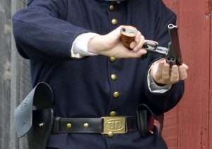 The S&W’s greatest advantage over the Colt was quicker reloading. There was no need for an ejector housing or loading gate. The topbreak S&W Schofield could be opened with one hand to pull the latch to the rear and by pressing the barrel against one’s leg or other surface, tilted down to automatically eject all six spent shell cases at once. The .177 caliber model does not eject them since the BB cartridges are re-loadable. As a result of this design deviation, the .177 shells have to be manually “dumped” from the cylinder to reload.
