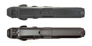 The barrel on the Umarex M&P40 (bottom) protrudes slightly further forward than the cartridge model’s barrel. In almost every respect the airgun duplicates the look, feel, and operation.