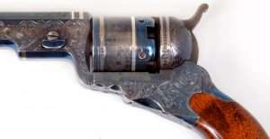 In this close-up of a Colt Paterson you can see how the barrel almost touches the front of the top cylinder chamber. The wedge, held in place by a screw, passes completely through the barrel lug and the cylinder arbor. This was the only means by which the barrel was secured to the lower frame.