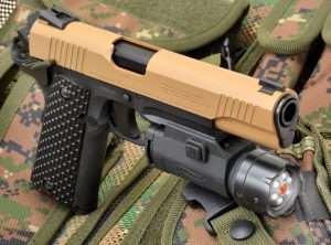 The Walther Night Force rail mounted tactical light uses six white LED lights surrounding a central Class IIIA red laser.