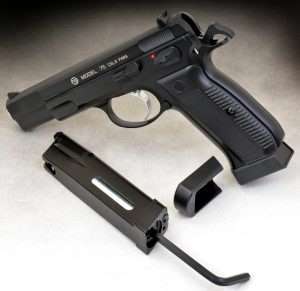 To load the CZ-75 CO2 and BB magazine, the SP-01-style base plate is removed from the bottom of the magazine to allow access to the CO2 channel and seating screw. A supplied hex head wrench is used to release and tighten the seating screw.