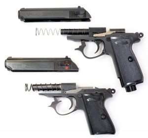 Traditional blowback action designs like the Walther PPK/S .380 ACP (bottom) and the Umarex Walther PPK/S share the same internal makeup with the barrel mounted to the frame and surrounded by the recoil spring.