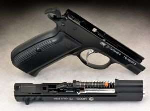 With the slide removed from the frame it is easy to see the blowback action-version of the CZ-75 air pistol’s short-recoil, locked-breech design. Note the barrel lug, guide rod and recoil spring design. The only difference is the lower camming lug contour, and that a screw is used to hold the guide rod and recoil spring in place against it. No further disassembly is required for the air pistol.