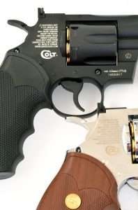 The Umarex Python models have a manual safety at the base of the hammer and a condition window on the right side of the frame that shows a white S or F.