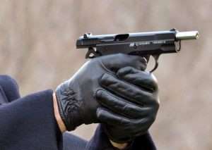 When the magazine is empty the slide locks back, just like a 9mm model.