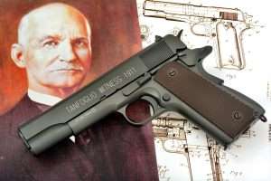 Pictured with a portrait of the 1911’s inventor, John M. Browning, and a copy of the patent for the 1911 dates Feb. 12, 1911, the CO2-powered Tanfoglio Witness 1911 is the closest in design to the later c.1924 version 1911A1.