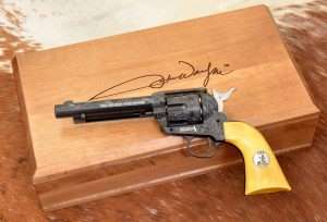 The Shootist is a 5-1/2 inch model with rifled barrel chambered for 4.5mm lead pellets. The authentically engraved revolver comes in a hardwood presentation box bearing John Wayne’s signature on the lid.