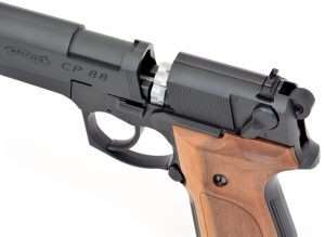 To load the CP88, the slide release lever is pushed down about 45 degrees allowing the forward portion of the slide, containing the 6-inch rifled barrel, to move forward on the frame. This allows access to the breech to insert an 8-shot rotary cast alloy pellet magazine.