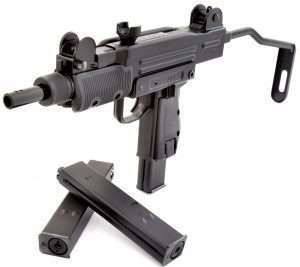 The Mini Uzi has a folding skeleton shoulder stock, selector switch for SAFE, FIRE and FULL AUTO at the top of the pistol grip and uses self contained CO2 BB magazines.
