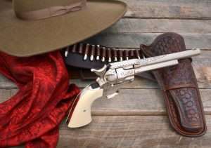 The nickel plated 7-1/2 inch barrel length Umarex Colt Peacemaker, presents a striking canvas for engravers to apply their skills. While a softer metal, the alloy frame pistols can be done ion the exact same patterns and detail. (Holster hand made by John Bianchi from a design worn by legendary U.S. Marshal Heck Thomas.