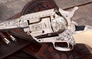 The depth and detail of Adams & Adams Nimschke-style engraving on the alloy framed Colts has intricate combinations of crosshatch patterns, foliate and banknote scrolls with a punch dot background.
