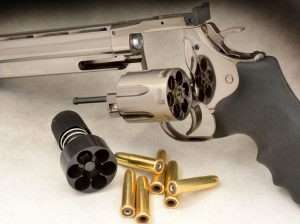 The Model 715 comes with six pellet-loading cartridges, which seat the pellet at the back of the shell (three are shown loaded) where the primer goes on a real centerfire pistol or rifle cartridge.