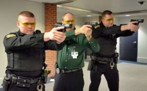 Deputy Steven Roudabush, Sheriff Reichelderfer, and Deputy Kaszubski prepare to unleash a volley from their Umarex S&W M&P40 training guns. During the first training exercise (watch for the video on the Umarex website) more than 150 shots were fired at a cost of just pennies compared to .40 S&W rounds. 