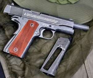 The weathered finish on the John Wayne 1911A1 gives the gun an authentic war worn look despite the verbiage that is necessary for airguns on the left side of the slide.