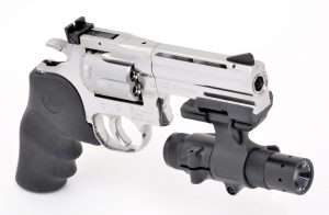 The practical advantage for the under barrel accessory rail on the 4-inch DASG Dan Wesson, is for mounting a tactical light like this quick mount light that can be position adjusted from the down position (pictured) to parallel to the side of the barrel.
