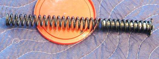 mainspring and guide