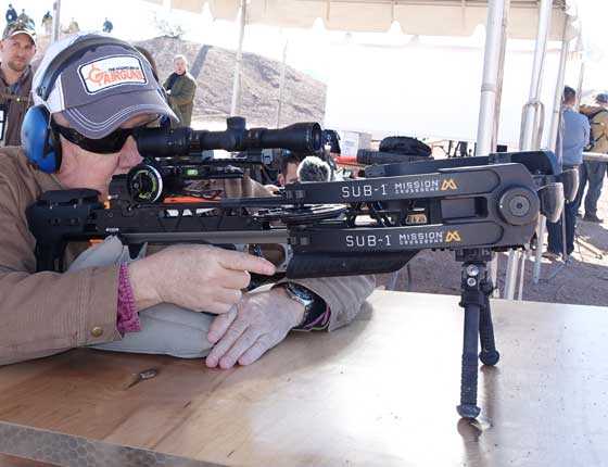 Tom shoots crossbow