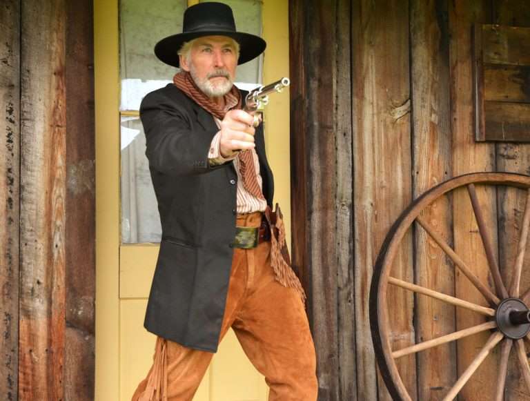 The author in period attire cross draws the Umarex Colt Single Action Army. The airgun has the same balance in the hand as a cartridge-firing Peacemaker. 