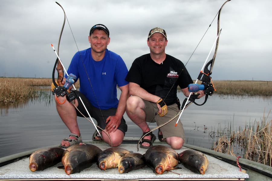 A good day on the water bowfishing carp. Two archers collect 6 carp through bowfishing.