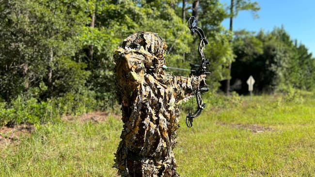 hunter shooting compound bow