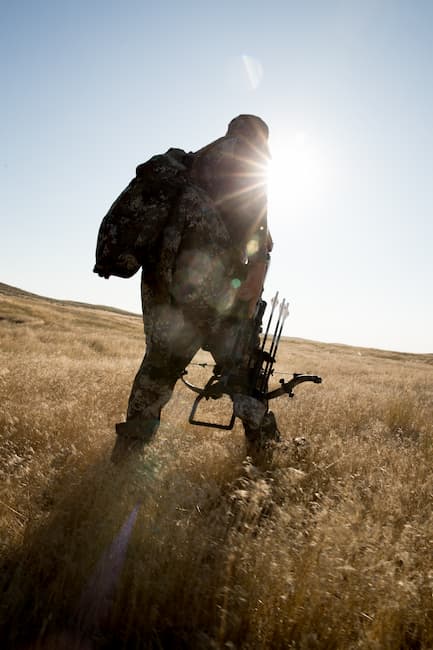 crossbow hunter in the sun