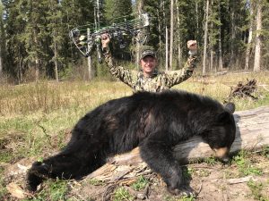 Kevin Wilson triumphant on bear bow hunting trip