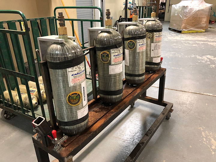 Cylinders pulled from warehouse waiting to go into cleaning program