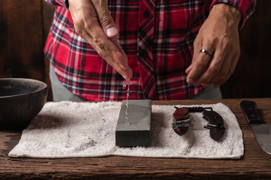 Prepare the stone for sharpening.